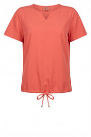 Joan | coral
